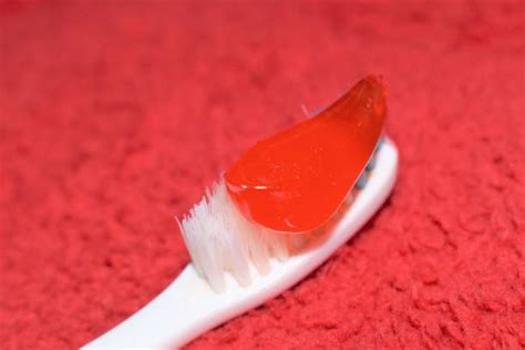 60+ Putting Toothpaste On Toothbrush Stock Photos, Pictures & Royalty ...