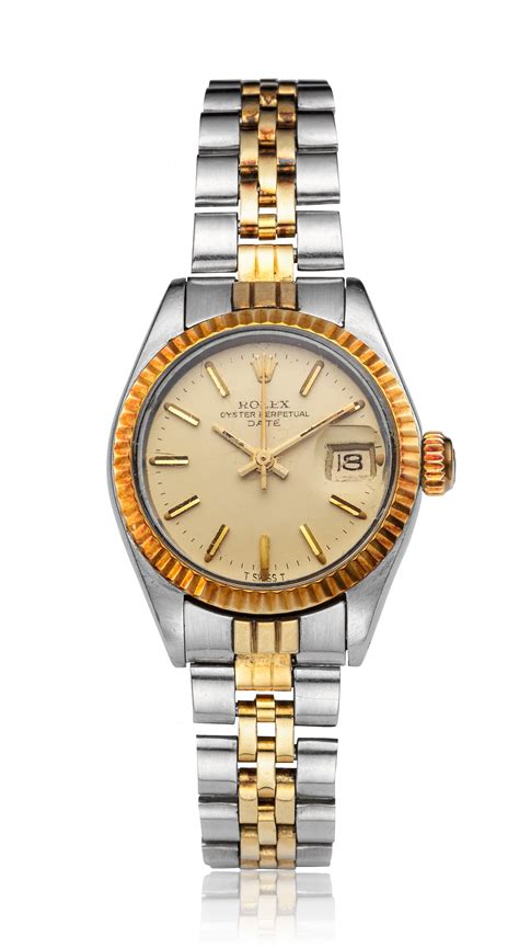 ROLEX, LADIES' TWO-TONE DATE, REF. 6917, | Christie’s