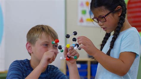 Students In School Classroom Looking At Stock Footage SBV-347619842 - Storyblocks