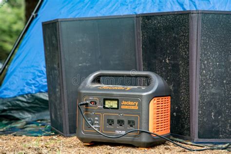 Tent Camping with a Portabable Power Battery and Solar Panel Editorial ...