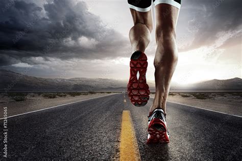 Sports background. Runner feet running on road closeup on shoe. Stock ...