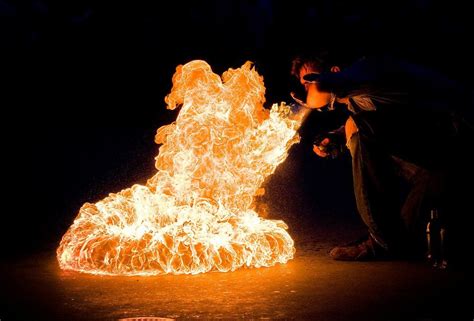 "The Campfire" - one of the riskier fire-breathing tricks : r/pics