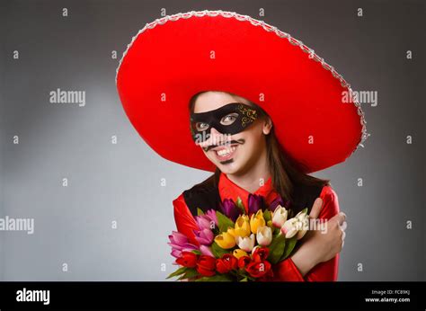 Person wearing sombrero hat in funny concept Stock Photo - Alamy