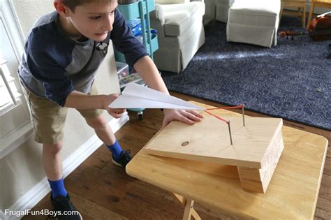 Power up your Planes with a Paper Airplane Launcher - Frugal Fun For Boys and Girls