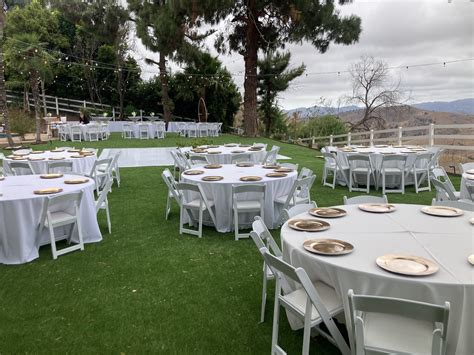 White Resin Folding Chair - Trio Event Rentals