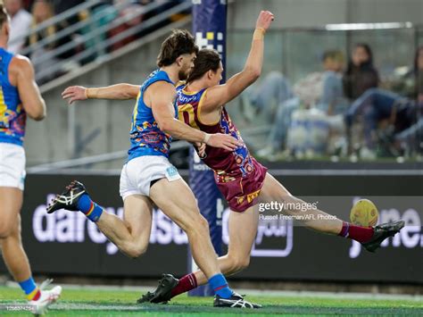 Eric Hipwood of the Lions kicks a goal during the 2023 AFL Round 10 ...