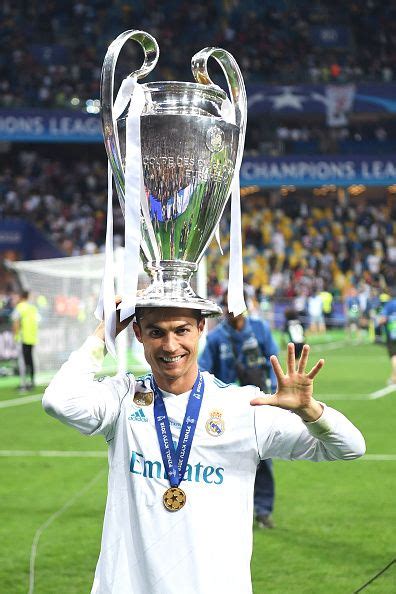 Cristiano Ronaldo of Real Madrid poses with the UEFA Champions League ...