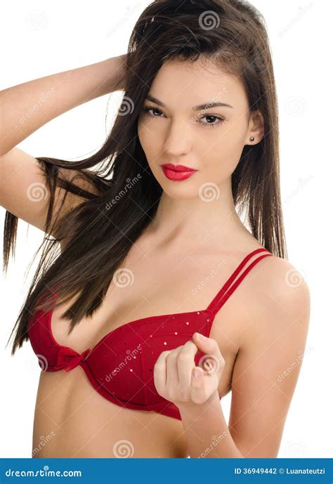 Woman In Red Bra Attracting You With The Finger. Seductive Girl With A Cleavage. Stock Photo ...