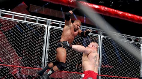 The 10 Best Cage Matches In WWE History Ranked