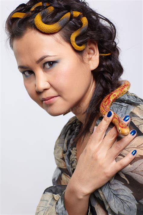 Woman with snake stock image. Image of hairdo, hairstyle - 20950355