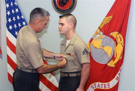 US Marine Corps (USMC) Brigadier General (BGEN) George Flynn (left), Commanding General ...