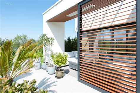 The Warmth of Timber and the Durability of Aluminium Louvres Combined – EBOSS