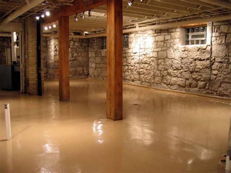 Rustic Finished Basement Theme With Natural Wood Pillars And Exposed Stone Wall And Wood Ceil ...