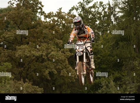 Motocross riders in race Stock Photo - Alamy