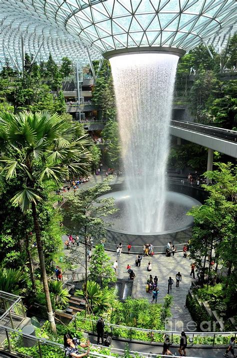 The Jewel waterfall monorail track gardens and visitors Changi Airport ...