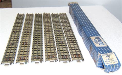 MM2010e Gallery: 29 6 Hornby Dublo 3-rail track, full size straights in a box.