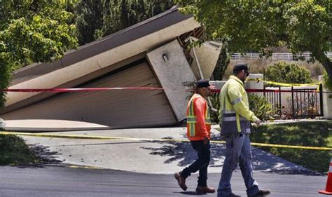 California landslide sparks panic after swallowing a dozen multi ...