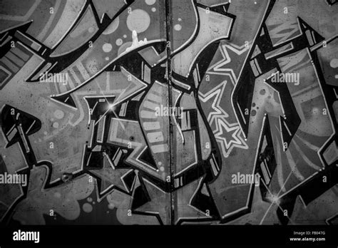 a city wall with graffiti in black and white, urban art Stock Photo - Alamy