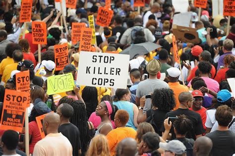 Protests pick up in Ferguson, weeks after shooting - Chicago Tribune