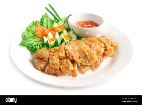 Hainanese crispy fried chicken without rice with soya sauce decorate ...