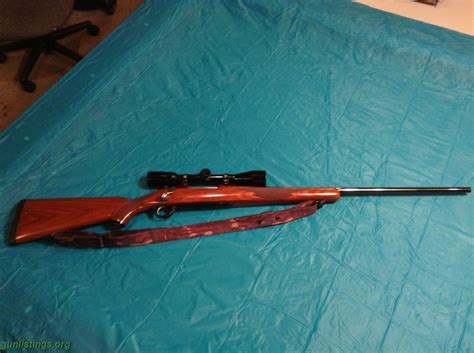 Gunlistings.org - Rifles Ruger M77 Mark II 7 Mm REM Mag. With Scope