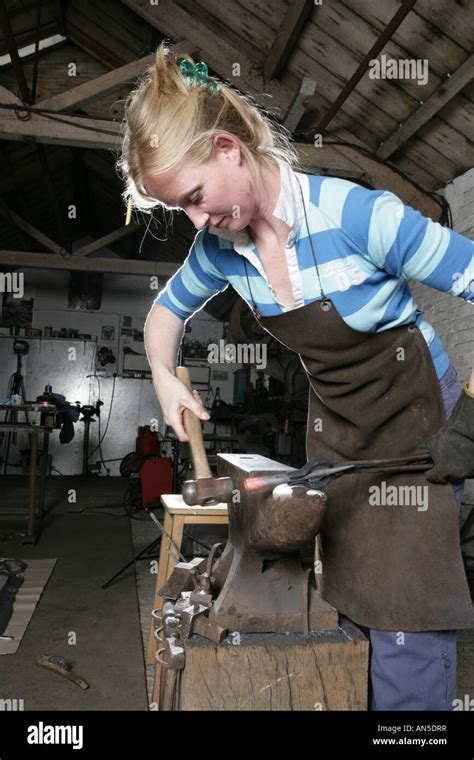 Artist blacksmith Melissa Cole working in her forge near Marlborough ...