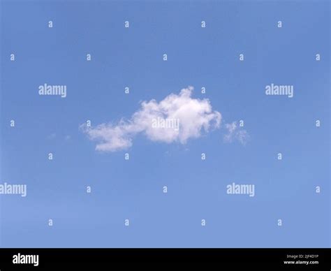 Single cloud in the sky, cloud shape photo. White summer cloud Stock ...