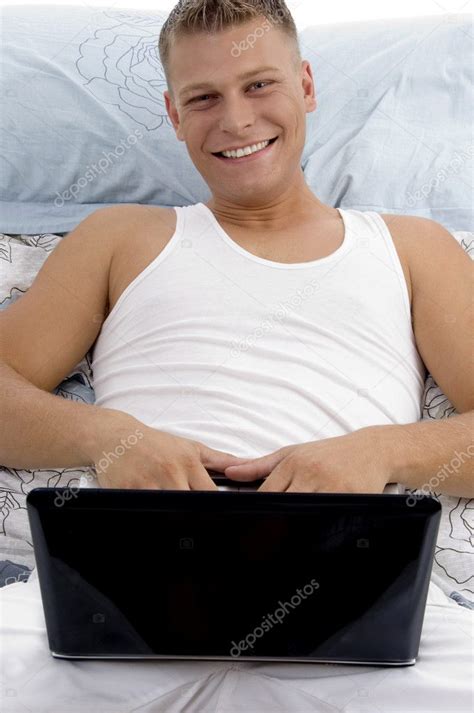 Young guy working on laptop — Stock Photo © imagerymajestic #1349014