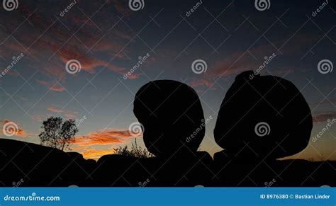 Devils Marbles Sunset stock photo. Image of tree, eroded - 8976380