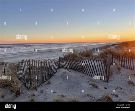 Beach, sunset, peaceful Stock Photo - Alamy