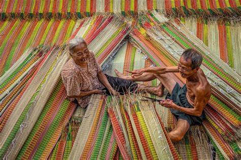 Premium Photo | Top view of old vietnamese lover craftsman making the ...