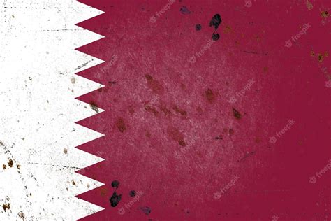 Premium Photo | Flag of qatar painted on a rustic old concrete wall surface