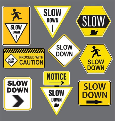 Slow Down yellow road sign isolated on gray. 16517603 Vector Art at Vecteezy