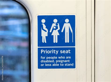 Priority seat in the London metro Stock Photo | Adobe Stock