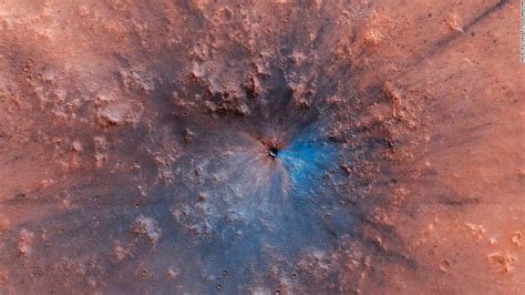 NASA releases new image of an impact crater on the surface of Mars. It ...