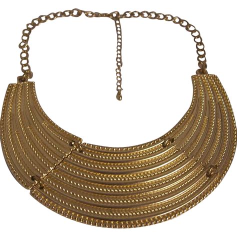 Egyptian Revival Cleopatra Style Bold Bib Collar Necklace Gold tone from modseller on Ruby Lane