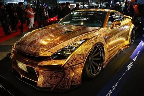 And a Nissan R35 GT-R was given a custom paint job so it appears to be made out of gold ...