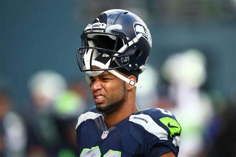 Seattle Seahawks player Golden Tate stands on the sidelines during ...