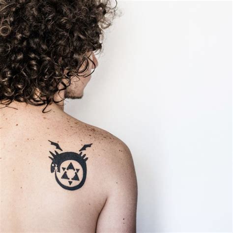 Homunculus Tattoo on the back | Tattoos, Unique tattoos, Tattoos and piercings