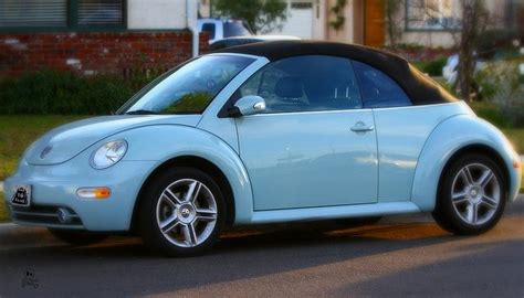 baby blue volkswagen beetle car - Denice Dorsey