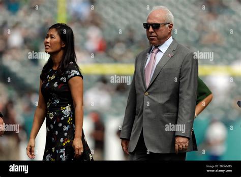 Philadelphia Eagles' Jeffrey Lurie and wife Tina Lurie walk the field ...