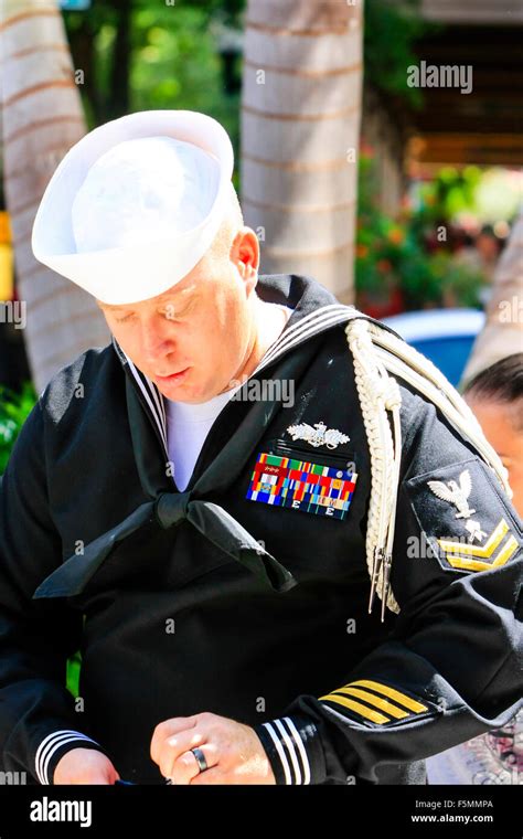 US Navy Petty Officer Second Class in his dress uniform at the Memorial ...