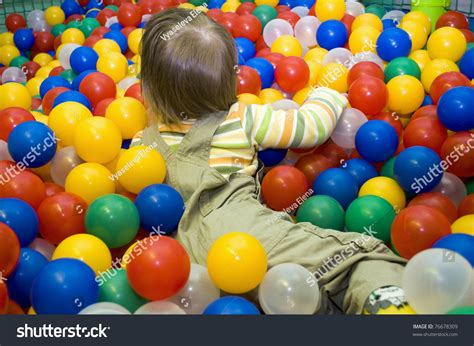 Baby Girl In Colorful Ball Pit Stock Photo 76678309 : Shutterstock