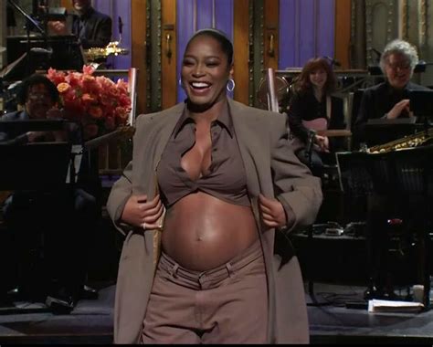 Keke Palmer reveals she's pregnant on SNL and shows off her baby bump in shocking live TV moment ...