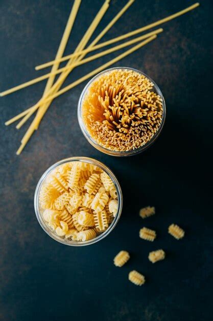 Premium Photo | Various pasta in a plastic jars for a long storage