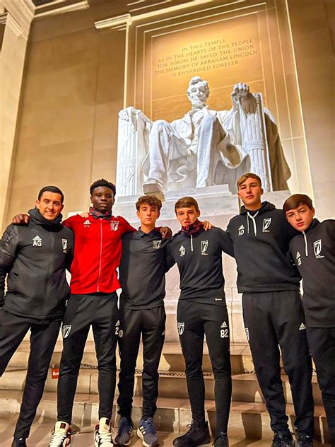 Liverpool academy players return from US football tournament