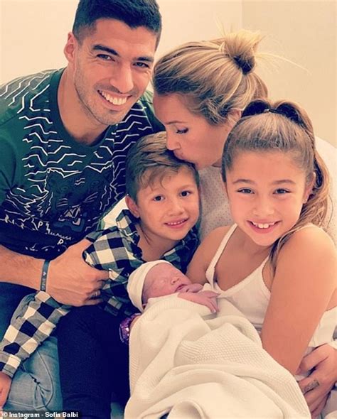 Luis Suarez shows off newborn son after starring in Champions League ...