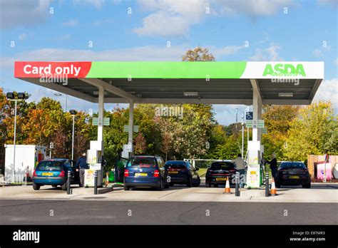 cars in an asda petrol station Stock Photo - Alamy