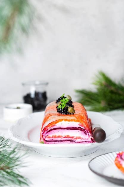 Premium Photo | Salmon terrine with cream cheese and beet