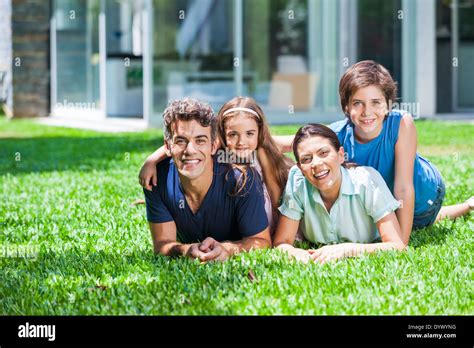 Family in big house Stock Photo - Alamy